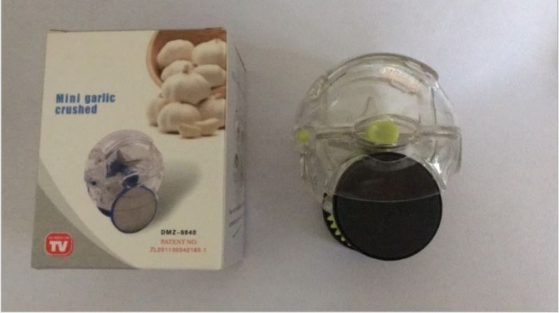 Hand-Push Garlic Crusher